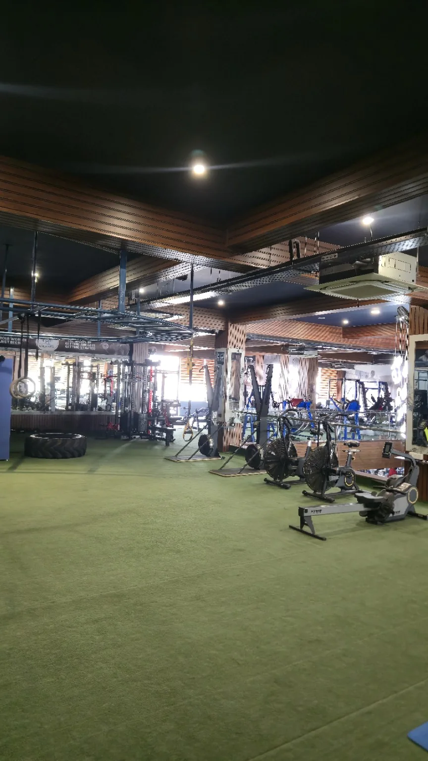 Functional turf with training rig, rings, air bikes and rowers